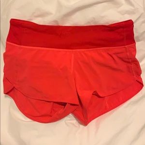 Lululemon 4-way Speed Short in Neon Orange/Red 4